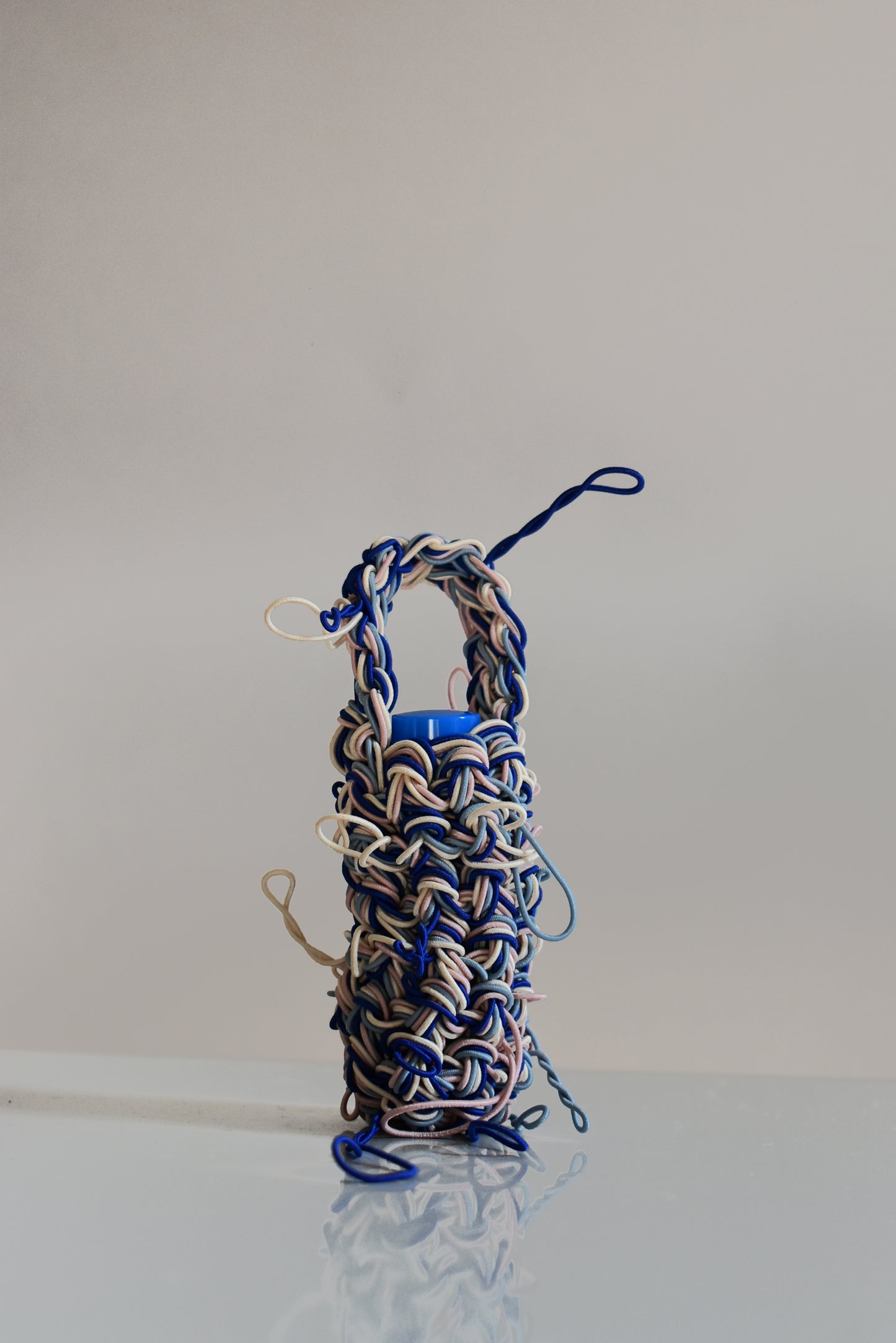 SHUKOU / tangled lip balm bag