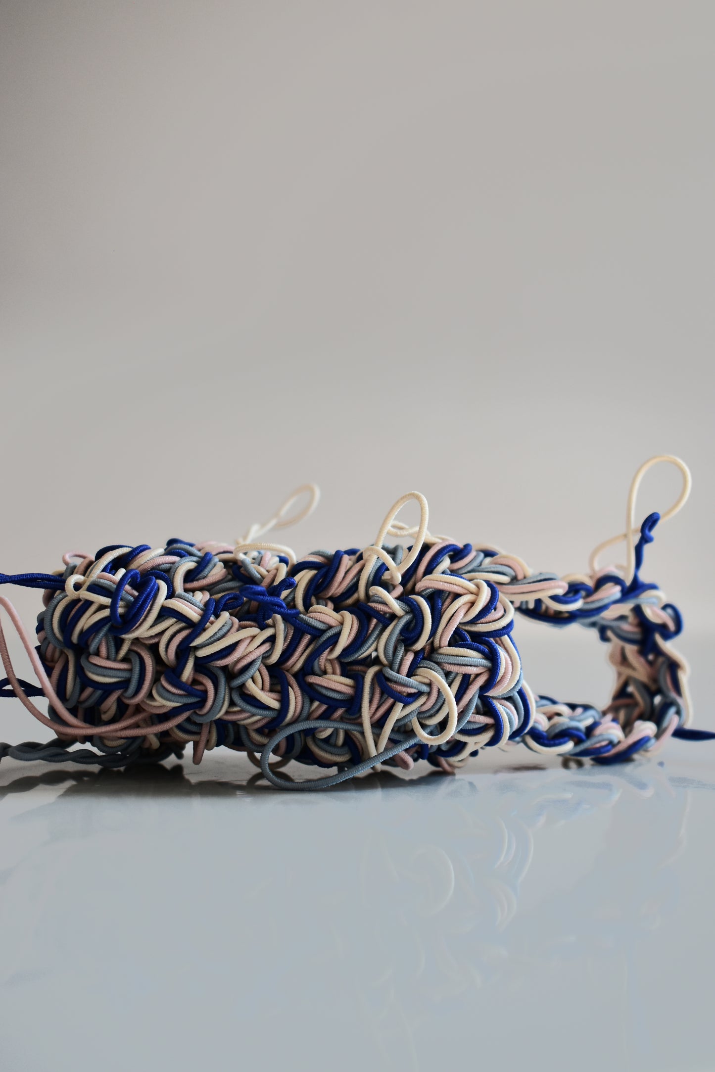 SHUKOU / tangled lip balm bag